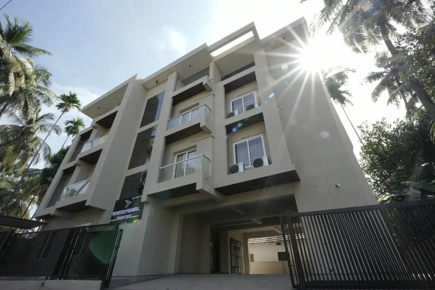 Exterior view of White Pearl Suites serviced apartment building in Mangalore